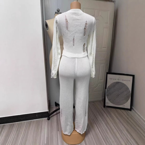 Women Solid hollowed-out top and ripped bell bottom pant two-piece set